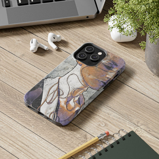 Urban grunge phone case on a wooden desk with laptop, earbuds, and notebook